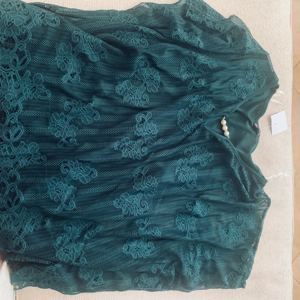 Brand new Beautiful rare bottle green top. Fashionable neck line. 2 X size.